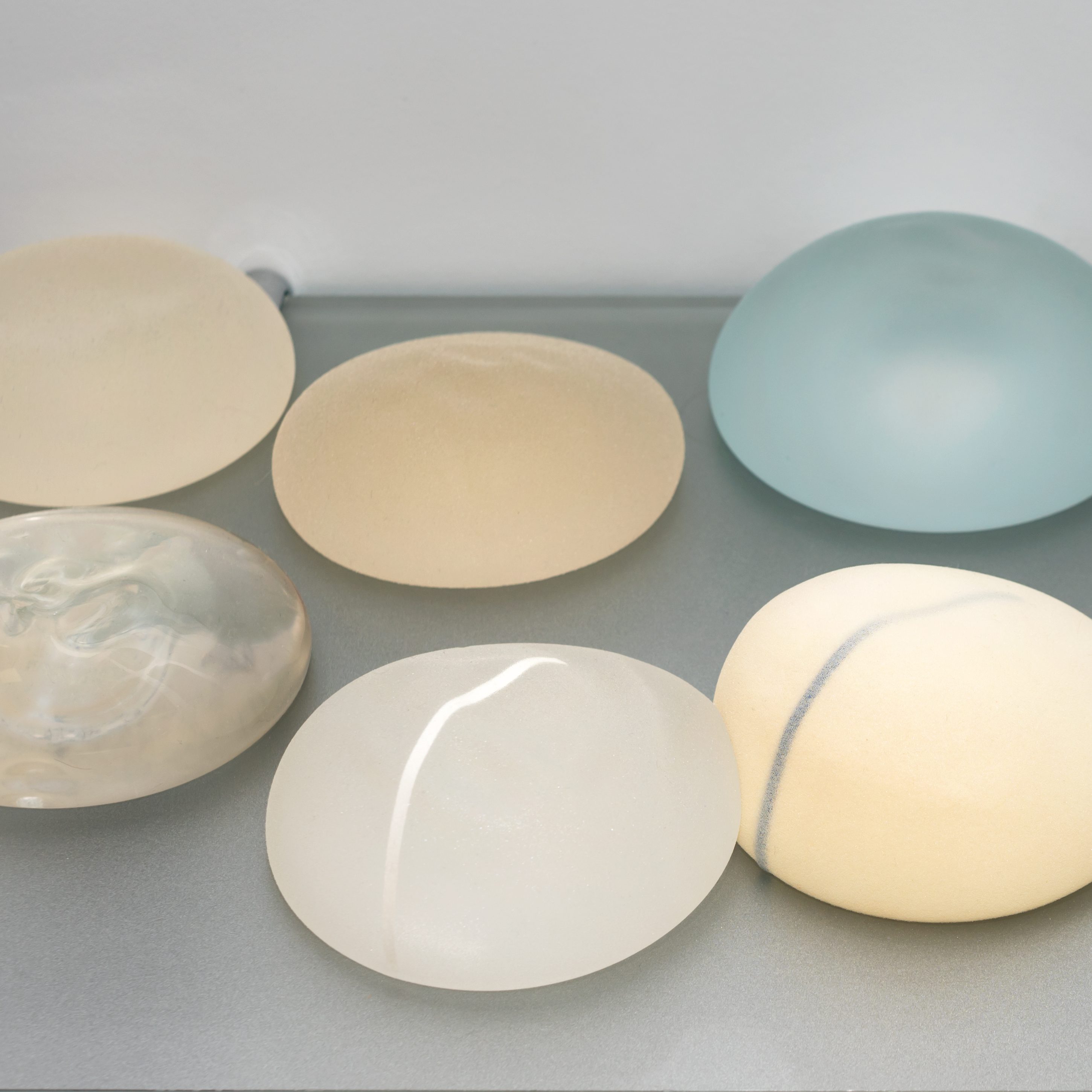 Breast implant revision Gold Coast, Implant removal and replacement surgery, Capsular contracture treatment Australia, Breast implant rupture surgery, Specialist plastic surgeon for implant revision